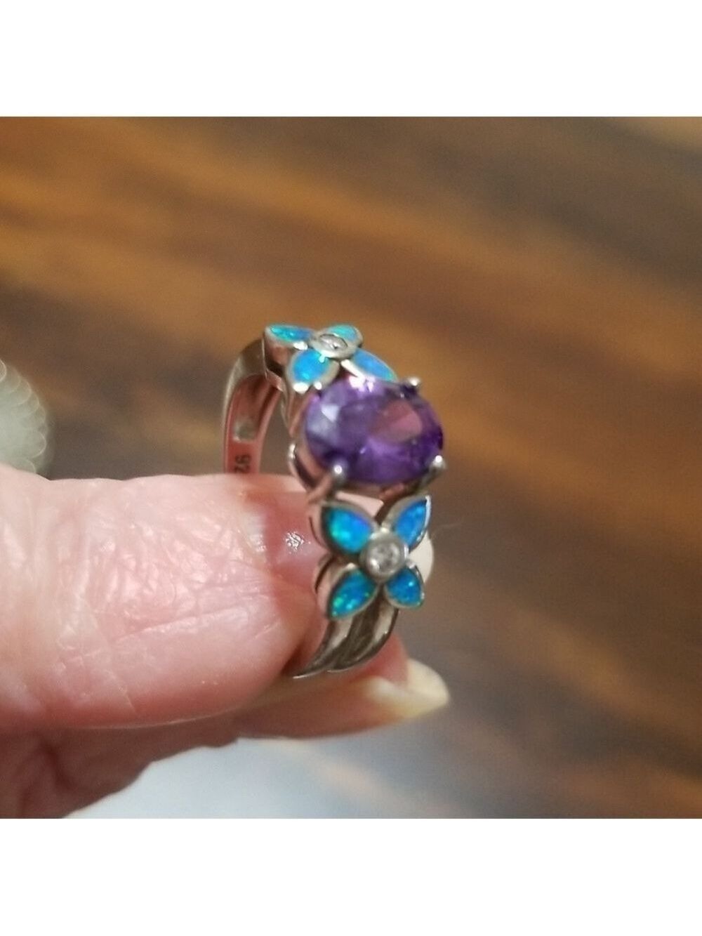Sterling silver ring with lab created stones ,size 7